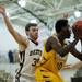 Dexter senior Andy McWilliams defends Ypsilanti junior Jaylen Johnson in the first half on Friday, Feb. 15. Daniel Brenner I AnnArbor.com